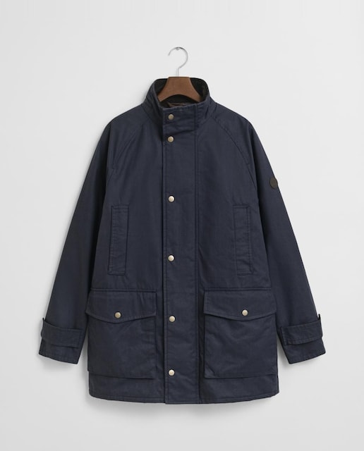 Imagen 0 de Chaqueta doble capa de hombre, versátil y resistente, con cierre frontal oculto, cuello alto y bolsillos inferiores.