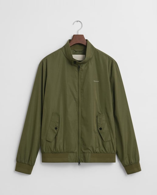 Imagen 0 de Chaqueta Harrington de hombre, ligera y repelente al agua, con cierre frontal, cuello alto y bolsillos laterales y interiores.