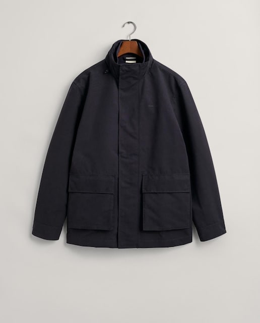 Imagen 0 de Chaqueta 2 en 1 de hombre, versátil y repelente al agua, con capucha de emergencia, cierre oculto y chaqueta interior desmontable con bolsillos.