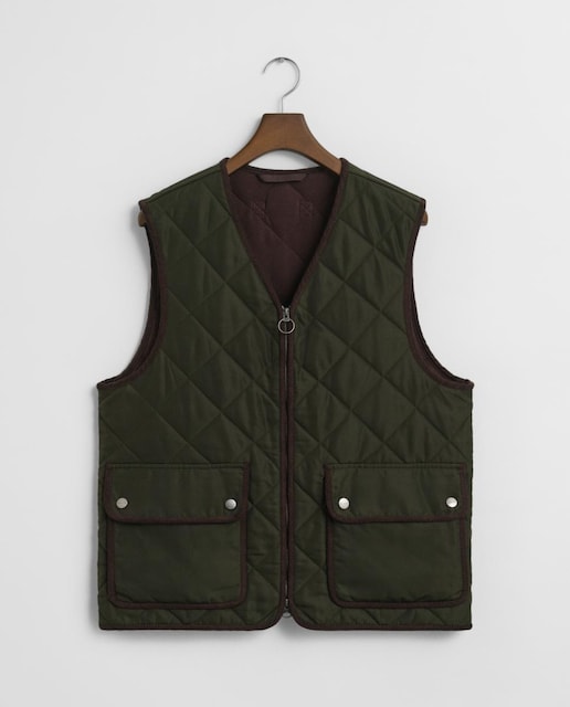 Imagen 0 de Chaleco acolchado de forro polar de hombre, cálido y versátil, con cierre de cremallera y bolsillos inferiores.