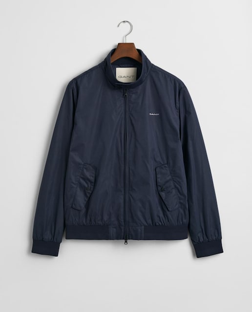 Imagen 0 de Cazadora Harrington de hombre, ligera y sostenible, repelente al agua, con cremallera bidireccional, cuello recto y bolsillos exteriores e interiores.