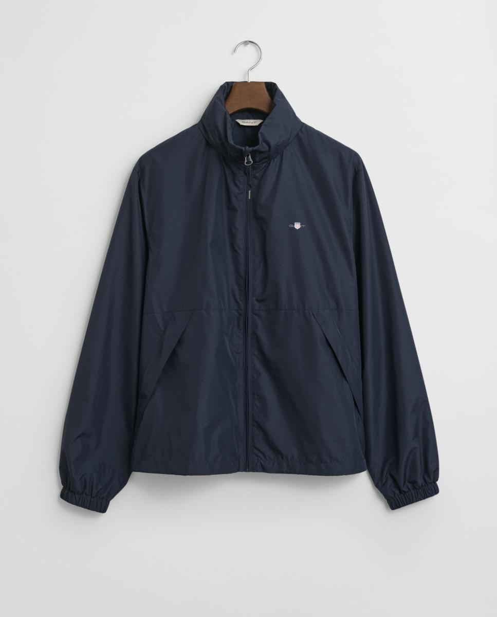 Imagen 0 de Chaqueta windcheater ligera de hombre, repelente al agua y sostenible, con cierre frontal, bolsillos laterales con cremallera y capucha de emergencia.