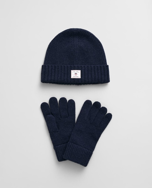 Imagen 0 de Set de invierno unisex que incluye gorro y guantes de mezcla de lana, con tejido acanalado y etiqueta en el gorro.