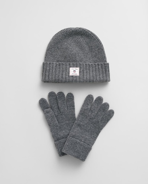 Imagen 0 de Set de invierno unisex que incluye gorro y guantes de mezcla de lana, con tejido acanalado y etiqueta en el gorro.