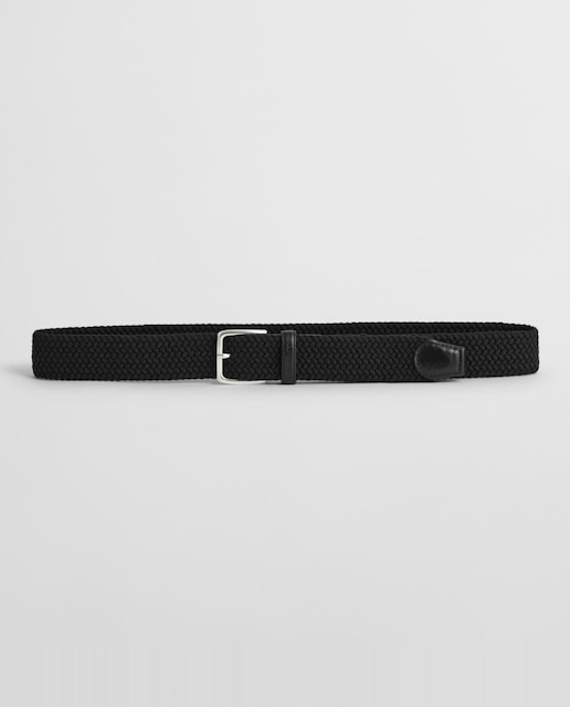 Imagen 0 de Cinturón trenzado de hombre en material flexible con detalles de piel, hebilla metálica.