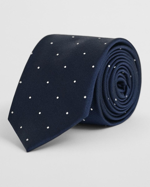 Imagen 0 de Corbata de hombre de seda 100%, con estampado de lunares y diseño con punta y ajuste adaptable.
