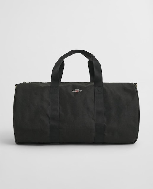 Imagen 0 de Bolsa de viaje de hombre en poliéster reciclado, con detalles en ante, herrajes en tono dorado envejecido y el escudo Archive bordado.