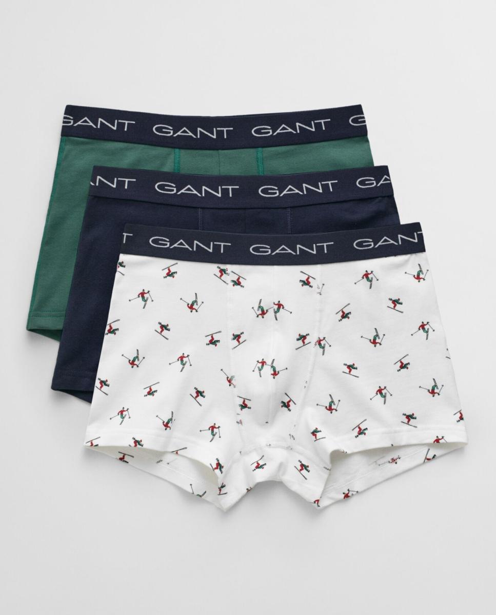 Imagen 0 de Pack de tres bóxers tipo trunk de hombre en algodón elástico con corte slim y cintura con logo GANT, incluido un modelo con estampado de esquí.
