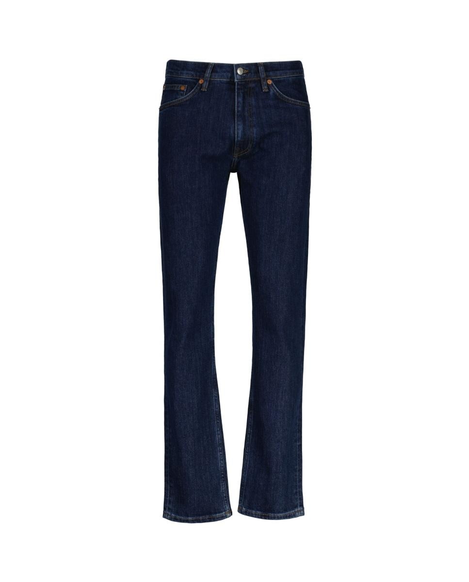 Imagen 0 de Vaqueros de hombre en denim índigo con corte slim y pierna ligeramente tapered.