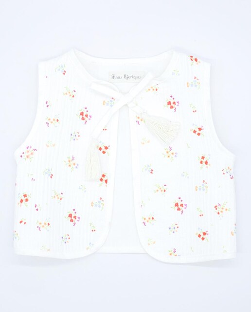 Imagen 0 de Chaleco  con flor , cinta para atar en el delantero.
