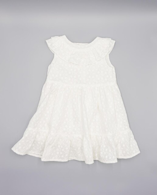 Imagen 0 de Vestido de voile bordado . De tirantes con doble volante en el cuello, falda fruncida con volante.