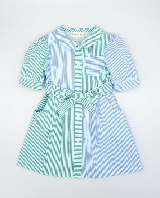 Imagen 0 de Vestido de manga corta combinado raya  y . Bolsillos, cuello y cinturon. Botones en el centro.