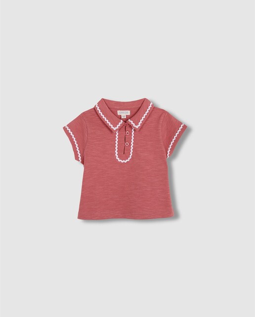 Imagen 0 de Polo de bebé niña con ric rac en otro color