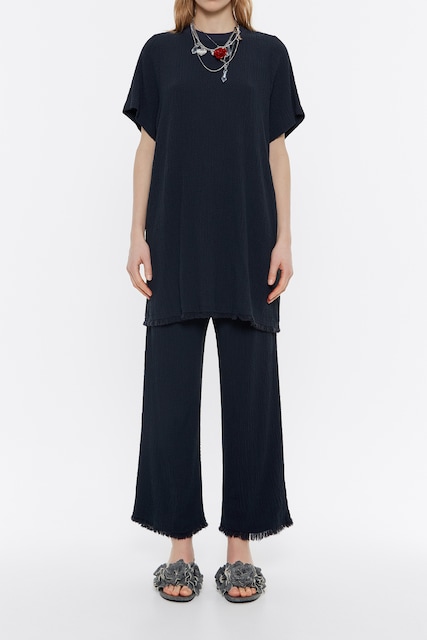 Imagen 0 de Pantalón recto desflecado de mujer