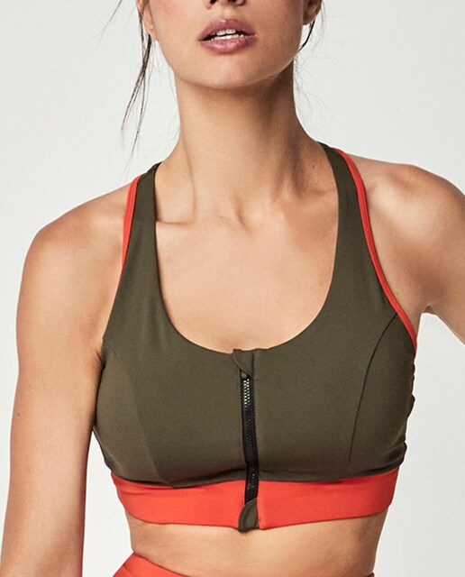 Imagen 0 de Top deportivo con cremallera de mujer