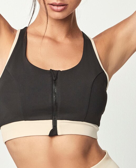 Imagen 0 de Top deportivo con cremallera de mujer