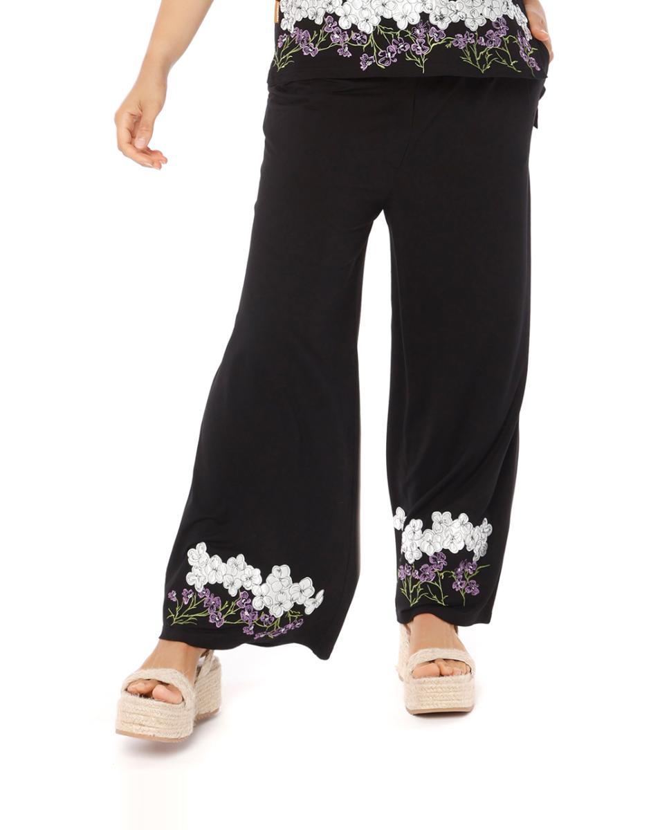 Imagen 0 de Pantalón ancho con botones y cremallera y bordado en ambas perneras