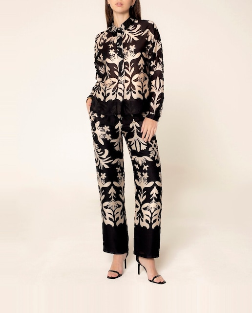 Imagen 0 de Pantalón ancho de mujer flído de tiro alto y estampado floral