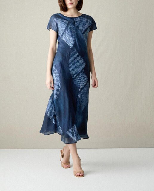 Imagen 0 de Vestido midi cortes con manguita dibujo