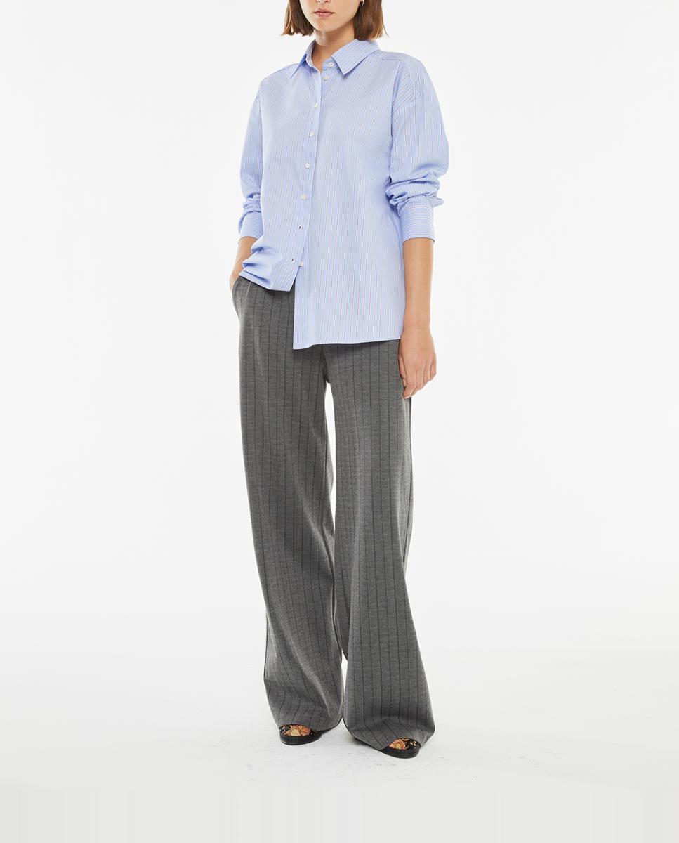 Imagen 0 de Camisa de mujer rayas azul con bolsillo frontal