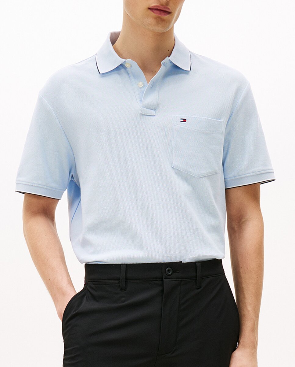 Imagen 0 de Polo de caballero con bolsillo y bandera bordada