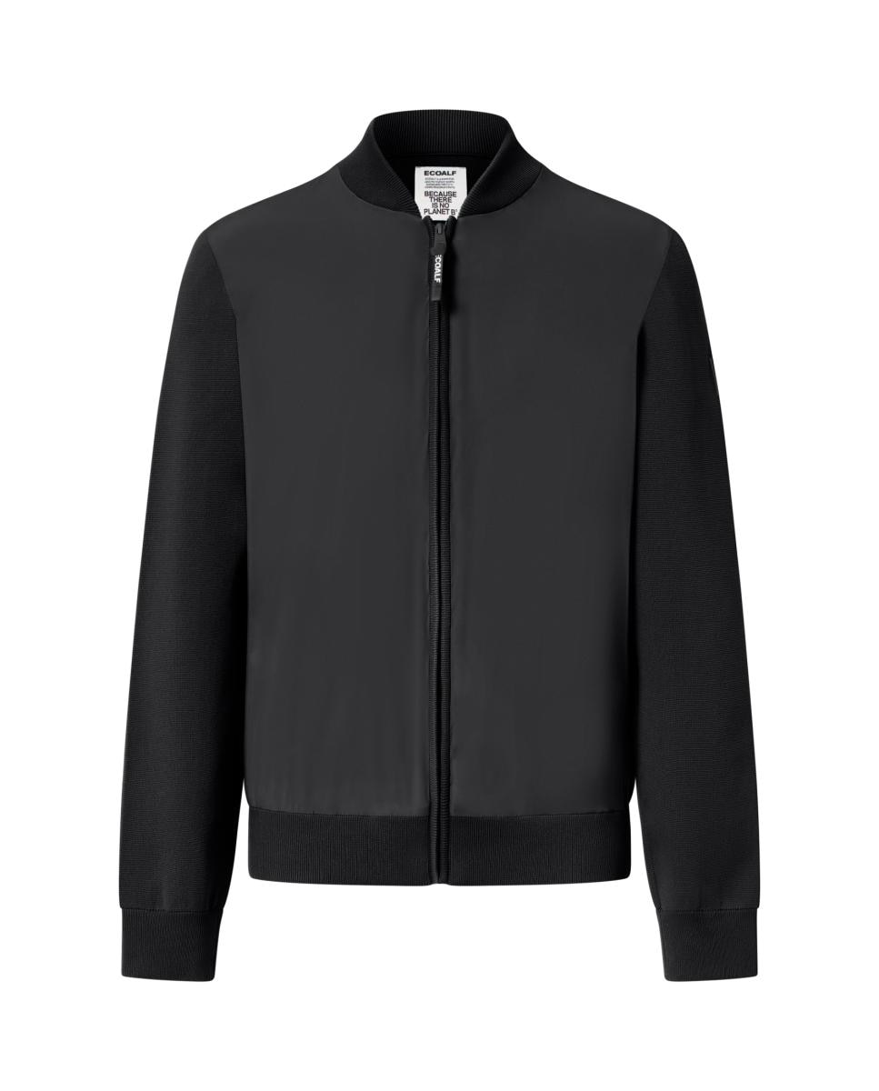 Imagen 0 de Chaqueta de punto liso en mangas y espalda ycuello, puños y dobladillo de canalé.