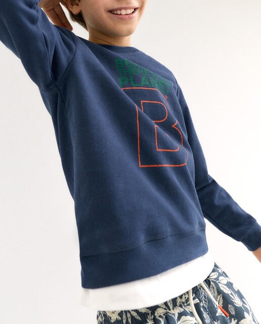 Imagen 0 de Sudadera niño con capucha y frase frontal
