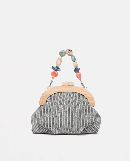 Imagen 0 de Bolso de mano con pedreria en gris