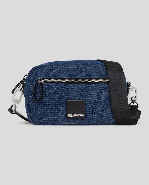 Imagen 0 de Bolso bandolera de mujer con cámara de tela vaquera lavada con logotipo
