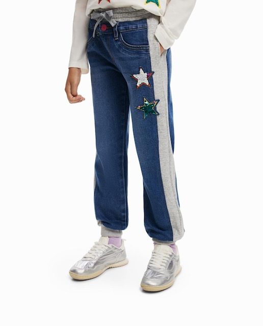 Imagen 0 de Pantalón largo denim combinado jogger de niña con estrellas