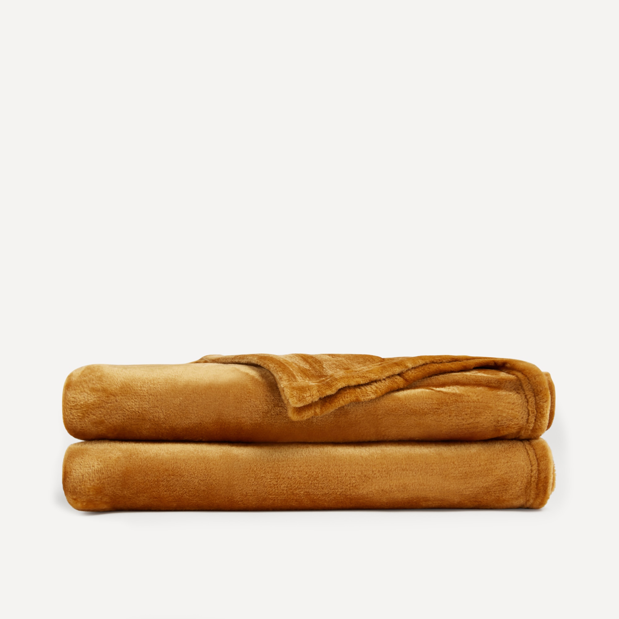 Manta decorativa Islandia Basics El Corte Inglés Mostaza-1