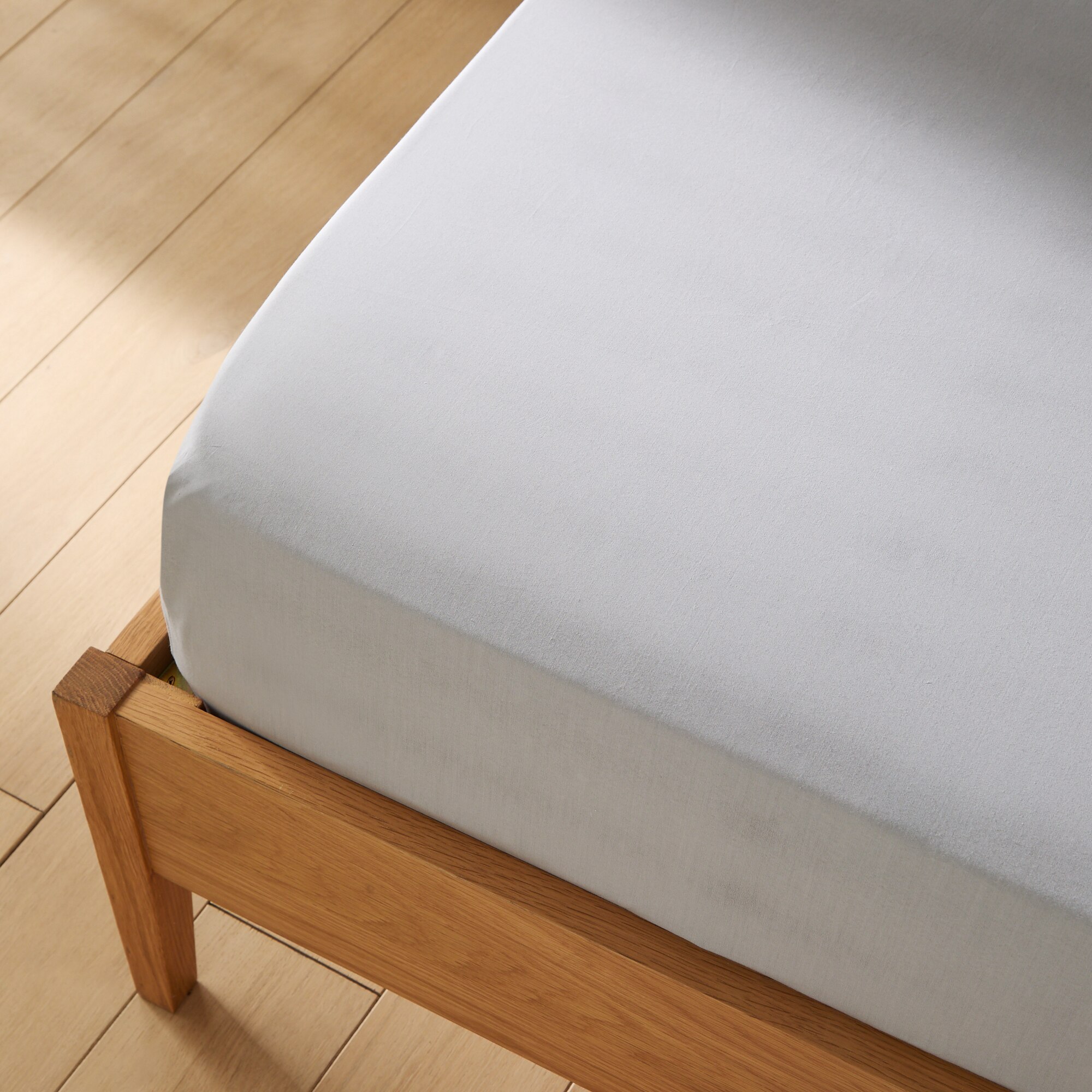 Sábana bajera infantil algodón sostenible New Fit Kids Mini Home - El Corte Inglés - Gris Cama 90 cm Gris-3