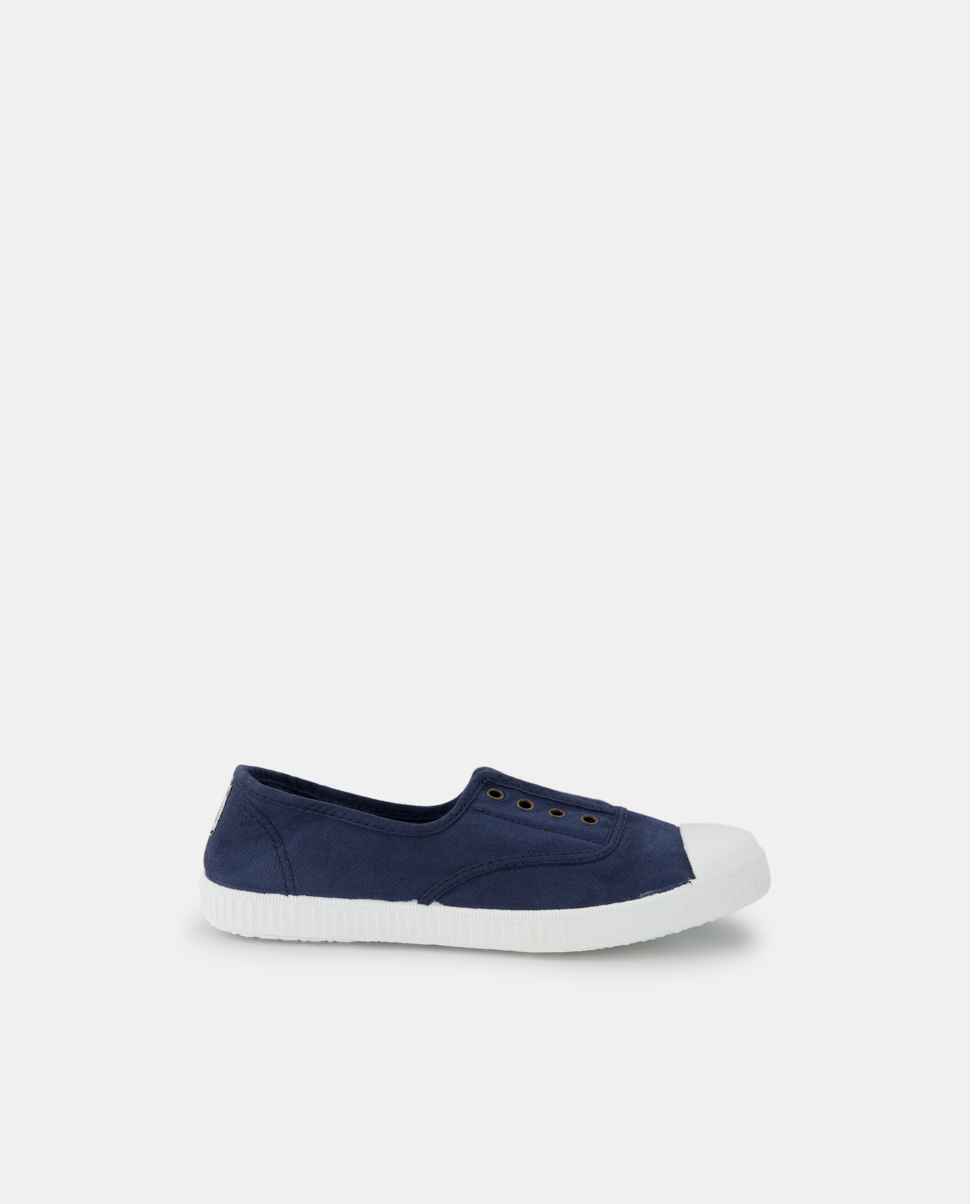 Victoria - Zapatillas de niños en amarillo bajas tipo casco de lona con puntera reforzada y cierre elástico.