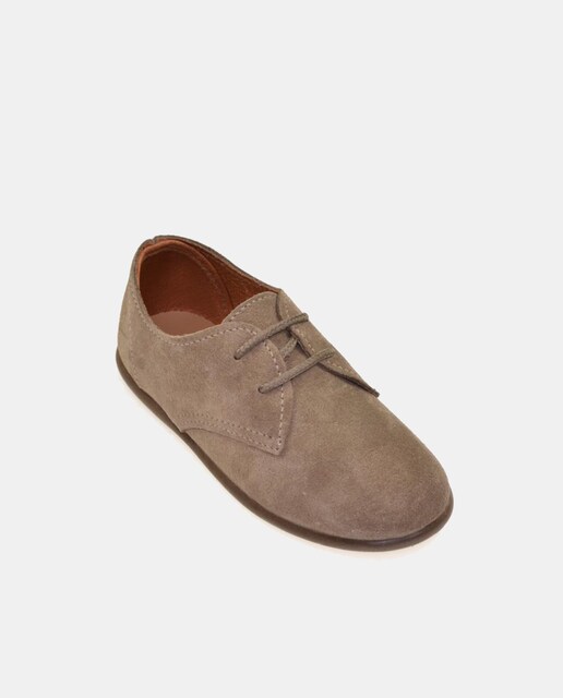 Imagen 0 de Zapatos de cordones de niño en piel con suela de goma