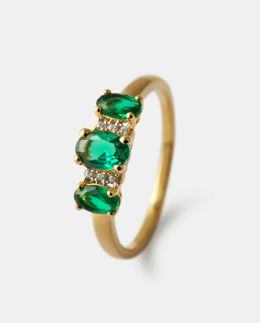 Anillo de oro con diamante y esmeralda