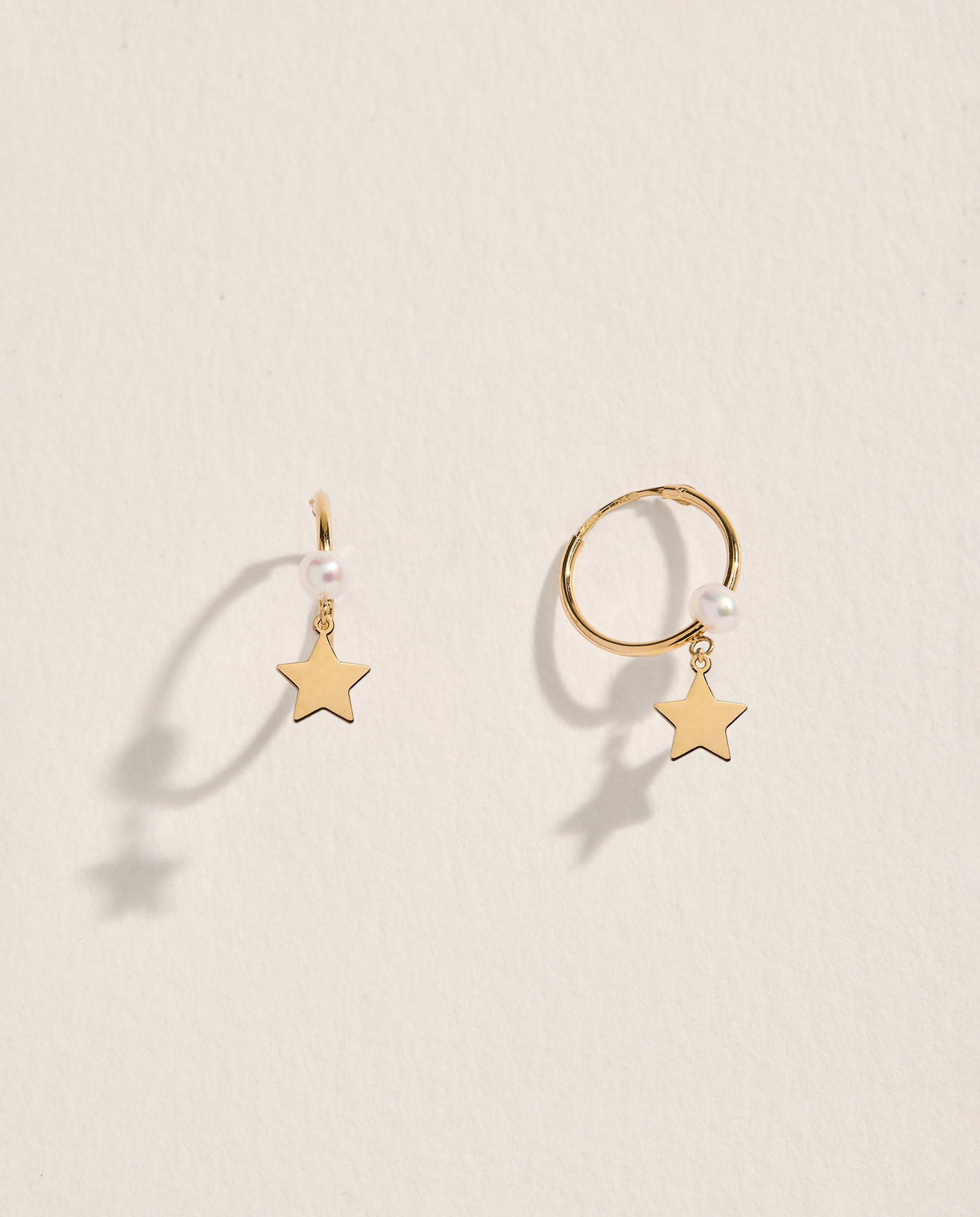 Pendientes Estrella de oro con perla - El Corte Inglés - Blanco Blanco-1