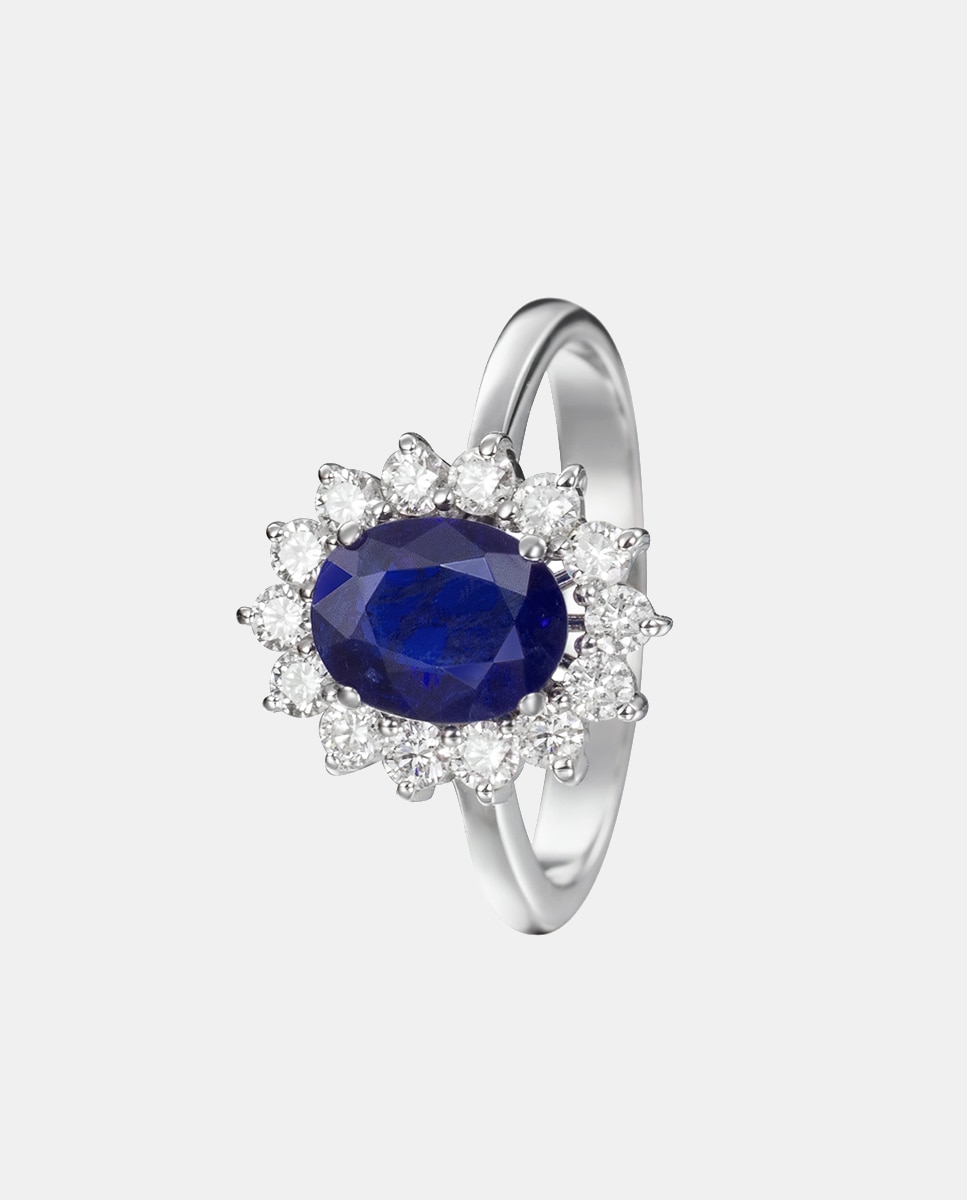 Imagen 0 de Anillo de oro con diamante y zafiro Azul