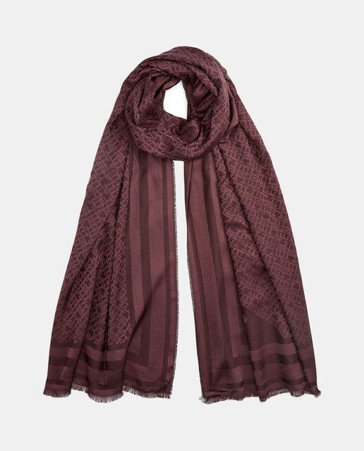 Imagen 0 de Fular de mujer en color burdeos con estampado monogram .