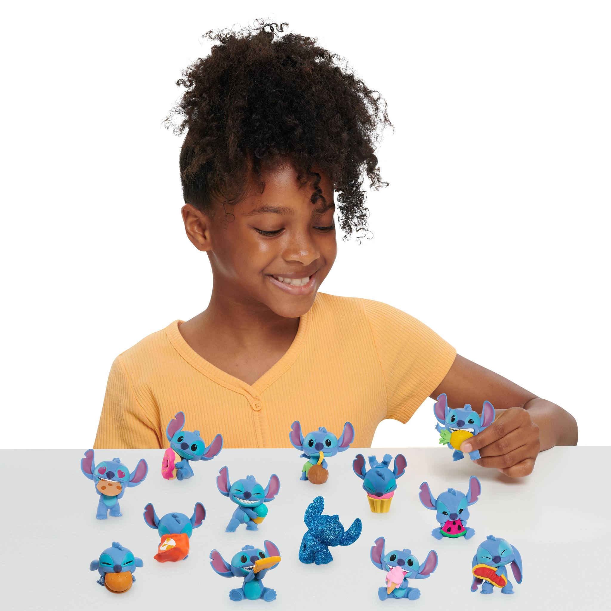 Cápsula sorpresa Mini Figuras Stitch modelos surtidos 7