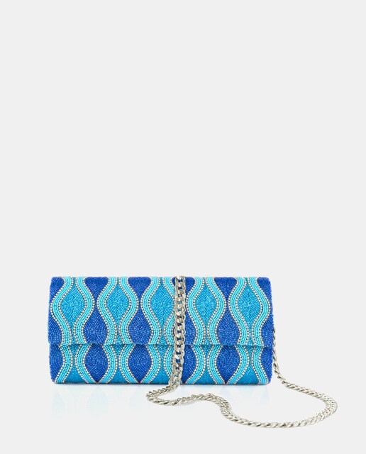 Cartera de mano color turquesa con cadena de latón