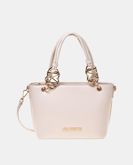 Imagen 0 de Bolso color crema con asa extraíble y hebillas con logo
