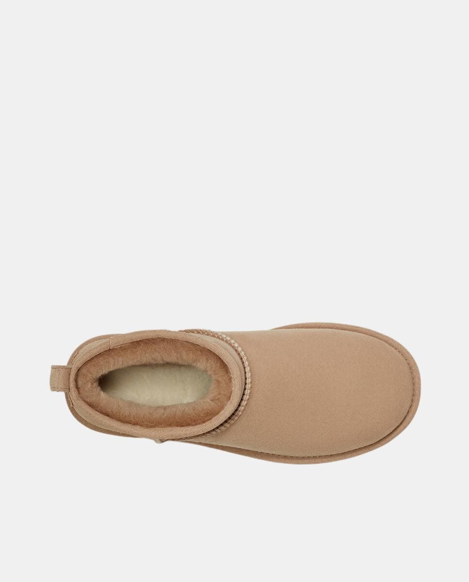 Botas Classic Ultra Mini em Pele com Forro de Pelo Bege-6