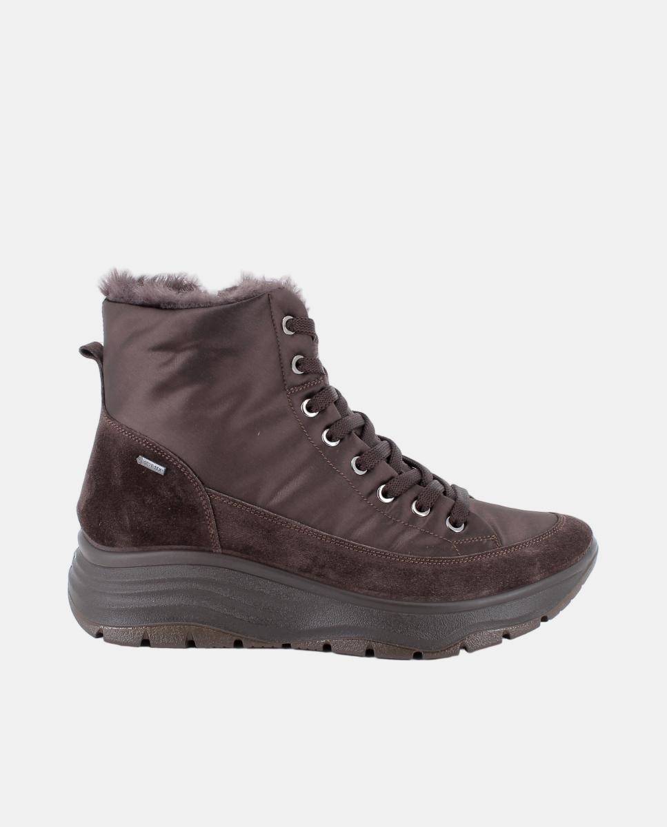 Imagen 0 de Botín de mujer, en tejido y piel, con cierre con cordone sy forro Goretex Marrón oscuro