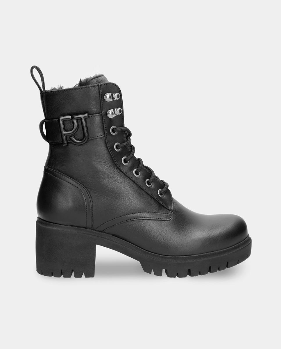 Imagen 0 de Botas de mujer en piel con forro de pelo sintético Negro