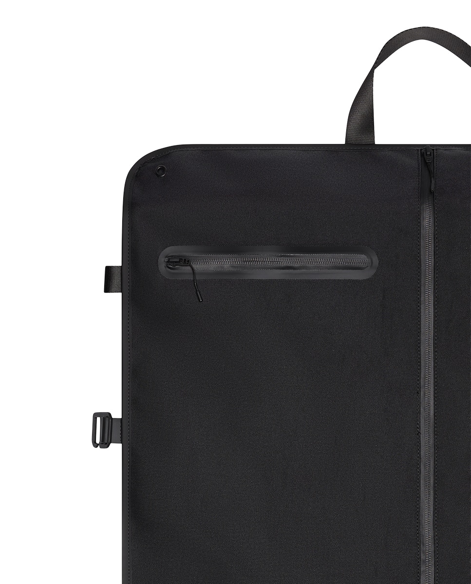 Portatraje OTG impermeable Negro Rains · El Corte Inglés
