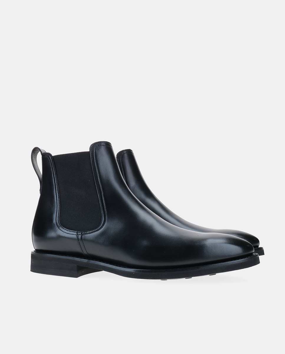 Imagem 0 de Botas Tipo Chelsea com Sola de Borracha e em Pele - Preto