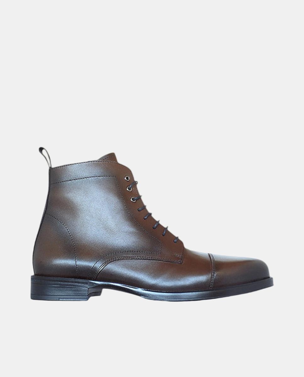 Imagem 0 de Botins com Biqueira em Pele