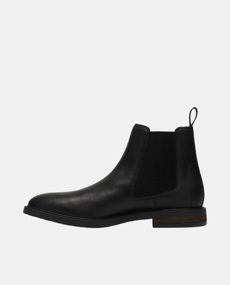 Imagen 2 de Botín de hombre de piel con elásticos laterales y suela de caucho termoplástico - Clarks - Negro Negro