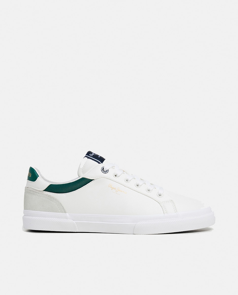 Imagen 0 de Zapatilla de corte bajo con suela vulcanizada y detalles en contraste de color. Verde