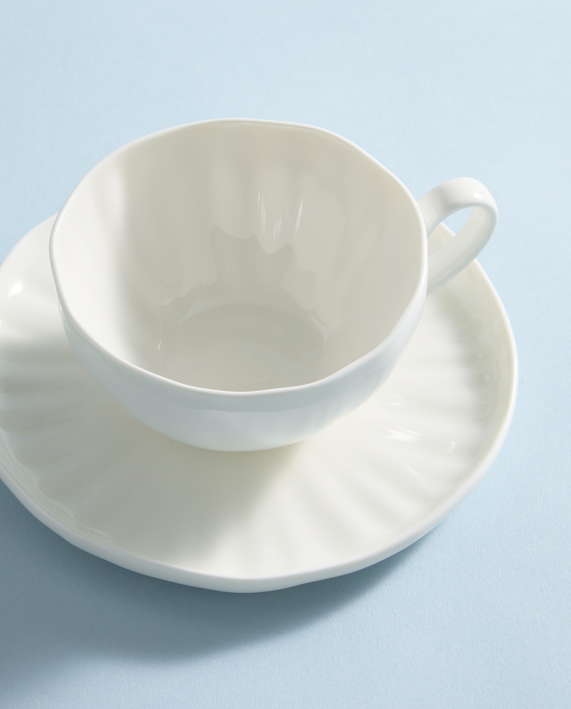 Imagen 0 de Taza de té con plato Lotus